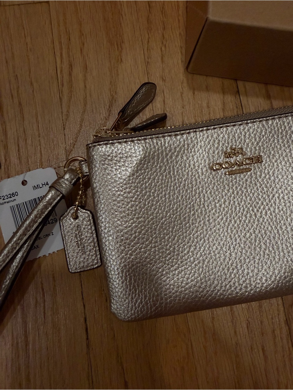 Coach Metallic Champagne Leather Wristlet